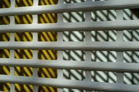 Modern rhythmic pattern sliding metal blinds for protection. Long banner Foto stock