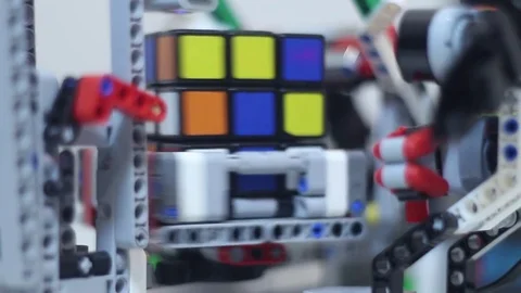 Modern robot assembles the puzzle Stock Footage 81787369