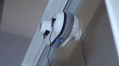 Modern robot washes a window Stock Footage 81787122