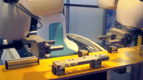 Modern Robotic Arm Preforming Precise Assembly Tasks Stock Footage 63930273