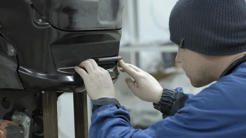 Modern Robotic Technologies. The engineer creates a modern robot or android Stock Footage 101368305