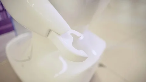 Modern Robotic Technologies. A man communicates with a robot, presses a plastic Stock Footage 86448727