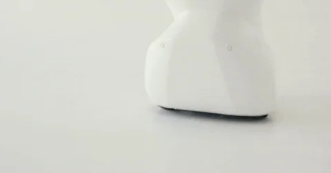 Modern Robotic Technologies. The robot looks at the camera at the person. The Video stock 80426181