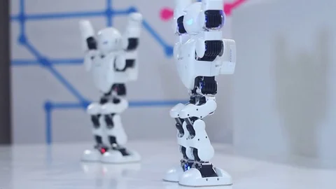 Modern robots are dancing for people Stock Footage 81784531