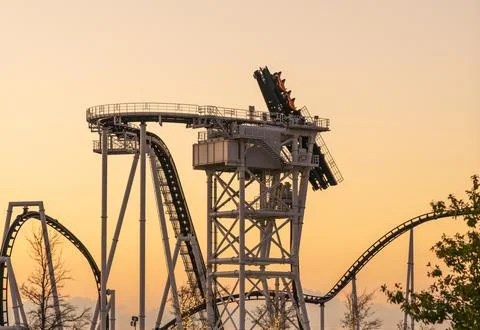 Modern roller coaster under test in Austin with the cars rotating vertically Stock Photos