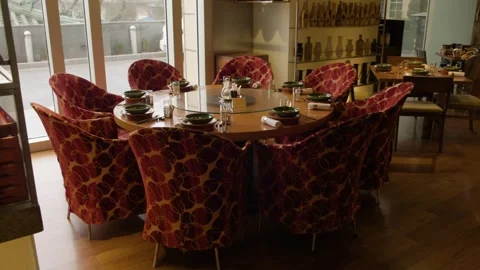 Modern Round Dining Table Set for Meal in Beijing Restaurant Interior Stock Footage 345777144