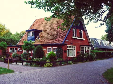 Modern row houses with brown bricks in Netherlands Stock Photos
