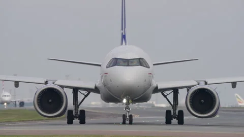 Modern SAS Airbus A320 Passenger Airplane Taxi Head On for Takeoff, Copenhagen Stock Footage 286048992