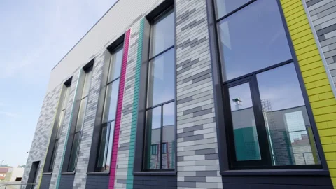 Modern school building facade decorated with tile pattern Vídeo Stock 335193808