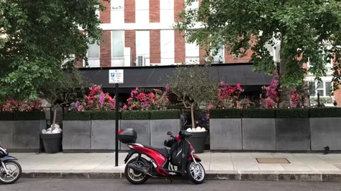 Modern Scooter parked in London Stock Footage 169075853