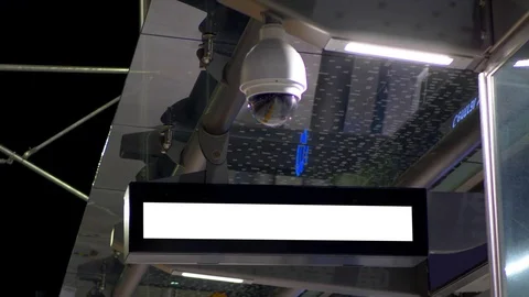 Modern Security Camera Surveillance Video Camera Dome and Digital Signage Board Stock Footage 83853777