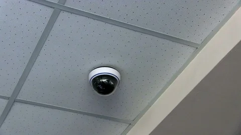 Modern Security System Camera Hangs From Ceiling Stock Footage 74009975