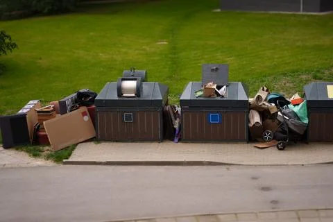 Modern semi underground garbage containers Stock Photos