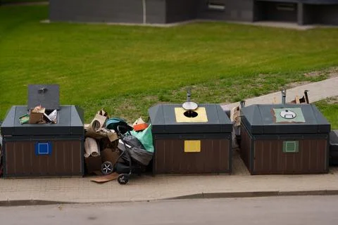 Modern semi underground garbage containers Фото