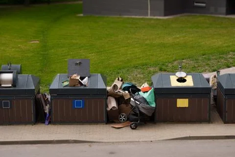 Modern semi underground garbage containers Stock Photos