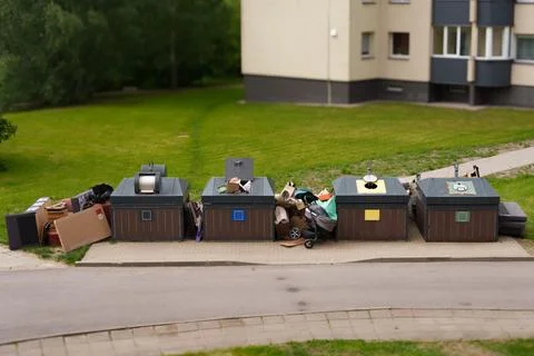 Modern semi underground garbage containers Stock Photos