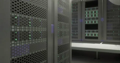 Modern server room featuring rows of storage units with green lights Stock Footage 306643720