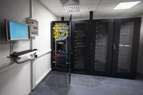 Modern server room interior with black computer cabinets Foto stock