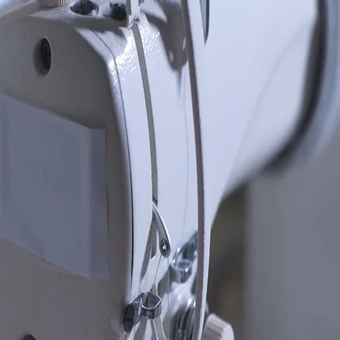 Modern sewing machine Stock Footage 69736050