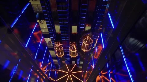 Modern shopping center with elevators with multi-colored led lighting in Moscow Stock Footage 88079661