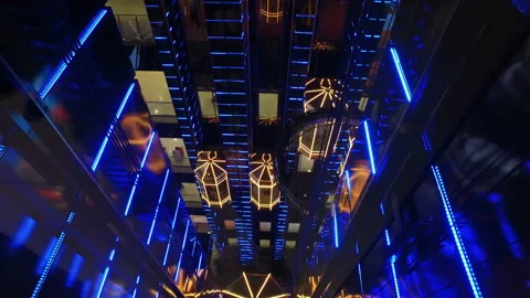 Modern shopping center with elevators with multi-colored led lighting in Moscow 스톡 동영상 88688845