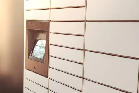 Modern shopping locker. Bar code reader for Skans QR Code on Mobile phone Self Stock Photos