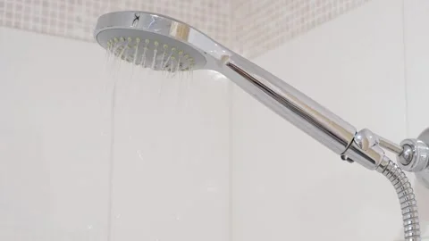Modern shower on the background of gray tiles in the bathroom close-up. Stock Footage 283077474