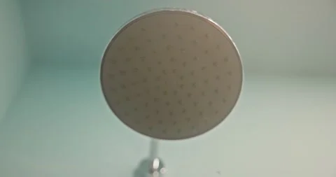 Modern shower head streaming water in bathroom Stock Footage 275347787