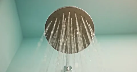 Modern shower head streaming water in bathroom Stock Footage 275347839