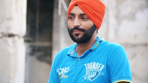Modern Sikh Young Man, Nodding Stock Footage 73537260