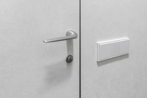 Modern Silver Door Handle without Rosette on Grey Texture Panel Photos