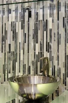 Modern Sink With Mosaic Tile Backsplash In A Contemporary Bathroom Design. Stock Photos