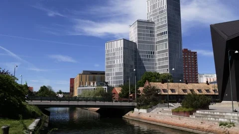 Modern skyscraper and waterfront canal view at Malmo Live in Malmo, Sweden Stock Footage 340960313