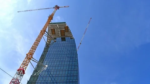 Modern skyscraper with curved lines under construction Stock Footage 107390214