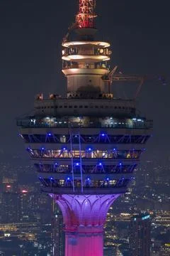 A modern skyscraper dominates the frame Stock Photos