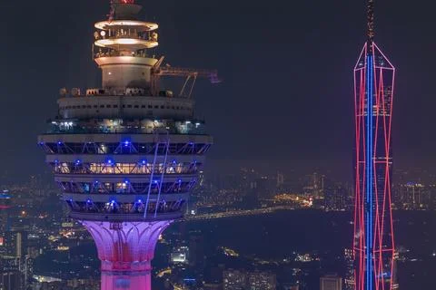 A modern skyscraper dominates the frame Stock Photos