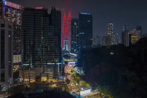 A modern skyscraper dominates the frame Stock Photos