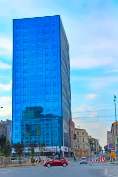 Modern skyscraper with equal windows standing in Polish city Lodz Fotos Stock