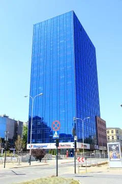 Modern skyscraper with equal windows standing in Polish city Lodz Stock Photos