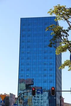 Modern skyscraper with equal windows standing in Polish city Lodz Stock Photos