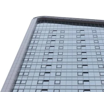 Modern skyscraper facade with grid windows isolated on white background. Foto stock