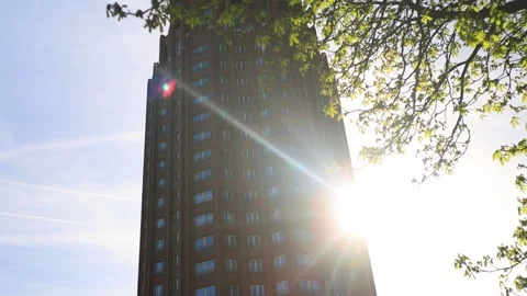 A modern skyscraper in the sun 4k video Video stock 332658230