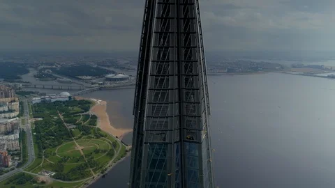 Modern skyscraper top multifunctional center Petersburg Bay Gulf cityscape Drone Stock Footage 128620970