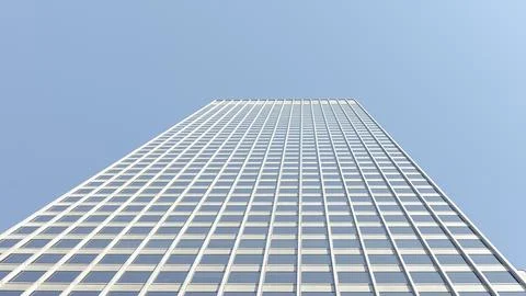 Modern skyscraper viewed from below, showcasing sleek glass facade and grid Stock Photos