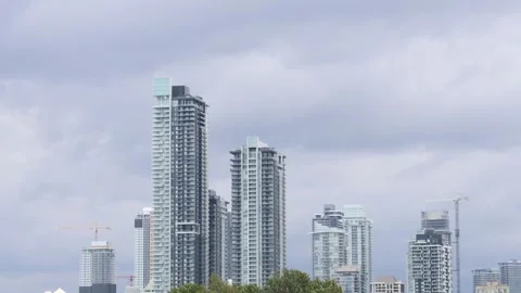 Modern skyscrapers with cloudy sky background in Vancouver Canada, background Stock Footage 340541971