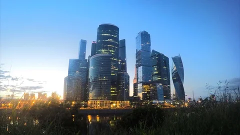 Modern skyscrapers in the evening timelapse Stock Footage 81607407