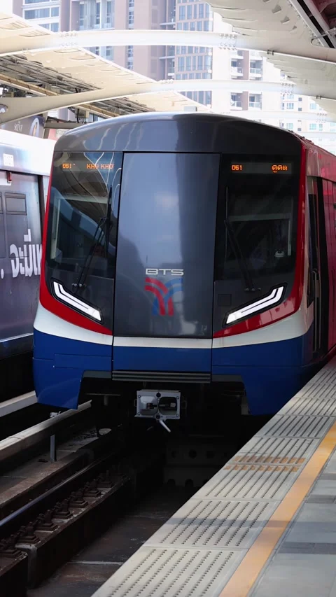 Modern Skytrain Arriving at Elevated Bangkok City Station Platform Stock Footage 324883582