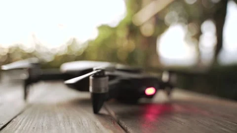 Modern small quad copter drone with digital camera Stock Footage 139027057