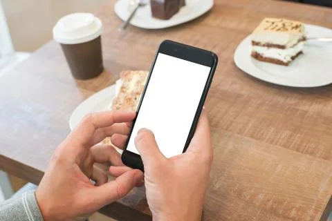 Modern smart phone mockup. Man holding cell with isolated screen for app pres Stock Photos