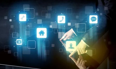 Modern smart table with high tech icons on its interface screen Stock Photos